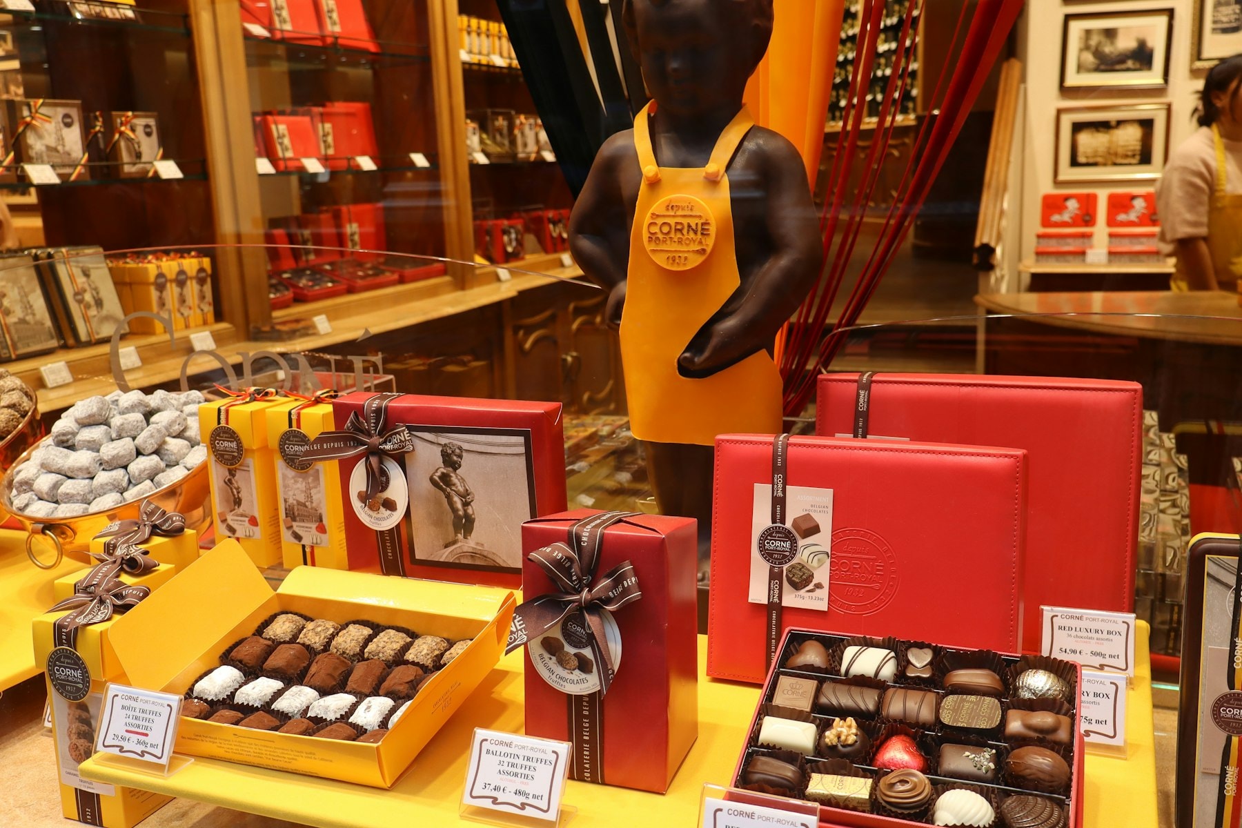 Assorted artisanal chocolates displayed in gift boxes