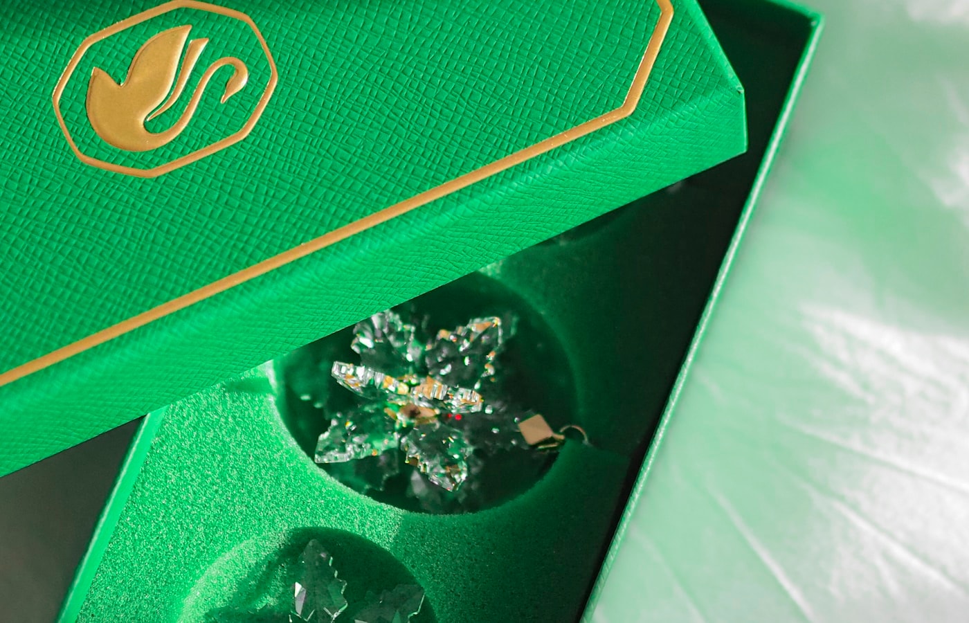 Emerald-green Coco Jalila gift box with gold foil detailing